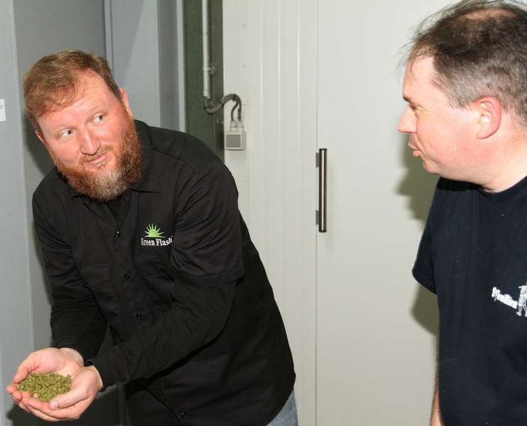 Chuck Silva & Alexis Briol, discussing hops
